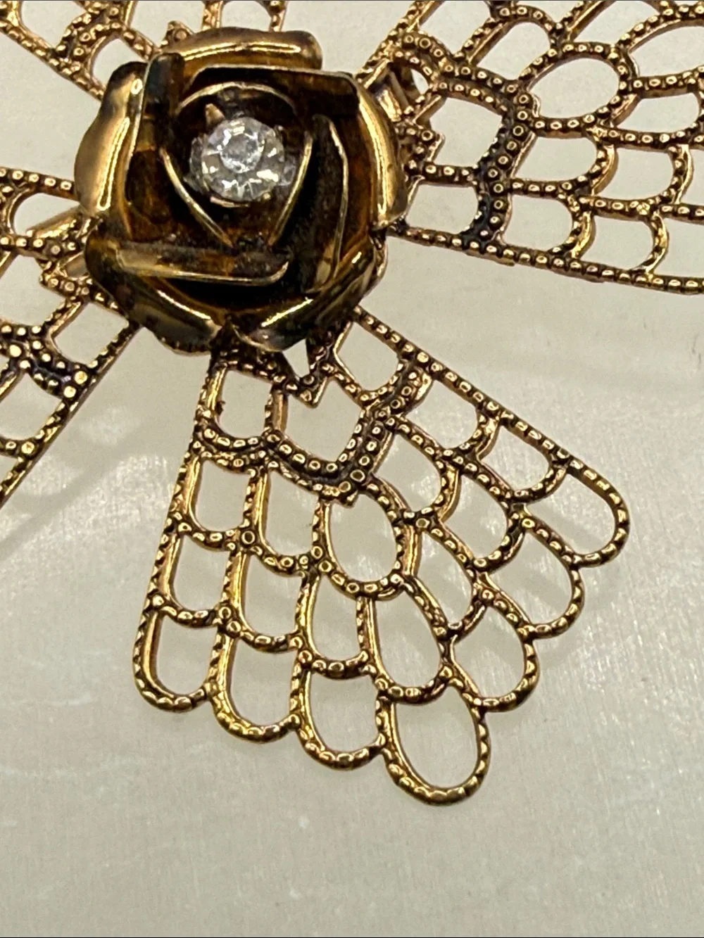 Gold Filigree Floral Brooch with Clear Crystal Center